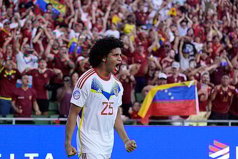 Venezuela's Eduard Bello celebrates after scoring a
goal